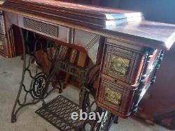 Antique Singer Treadle Sewing Machine in Oak Cabinet 1890's