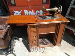 Antique Singer Treadle Sewing Machine unique Cabinet