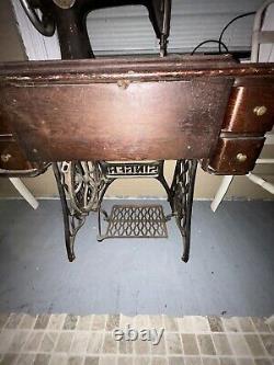 Antique Singer sewing machine and desk. G series serial number