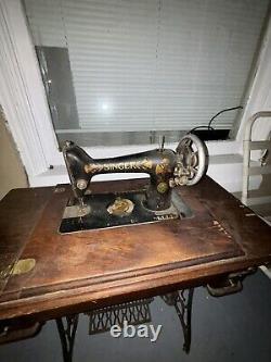 Antique Singer sewing machine and desk. G series serial number