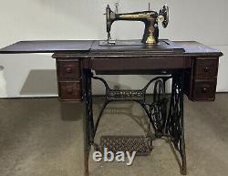 Antique Singer sewing machine in cabinet, early 1900s, all original