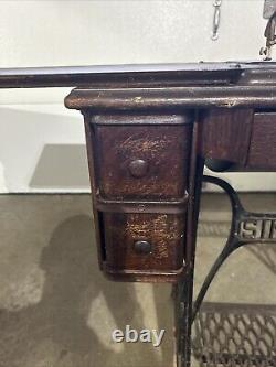 Antique Singer sewing machine in cabinet, early 1900s, all original