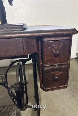 Antique Singer sewing machine in cabinet, early 1900s, all original