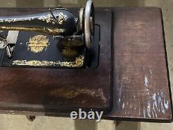 Antique Singer sewing machine in cabinet, early 1900s, all original