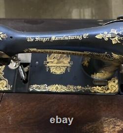 Antique Singer sewing machine in cabinet, early 1900s, all original