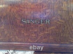Antique Singer sewing machine with tiger oak curved case (Priced Reduced)