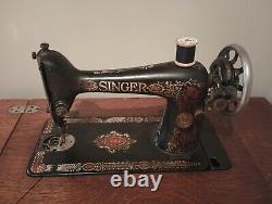 Antique Singer treadle Sewing machine in Cabinet