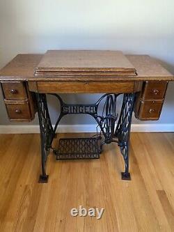 Antique Singer treadle sewing machine and cabinet 1919 BEAUTIFUL! Red eye