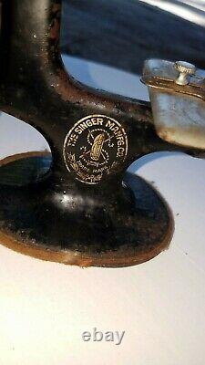 Antique childs hand crank singer sewing machine