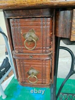 Antique early 1900's Singer Sewing Machine Lotus treadle cabinet withattachments
