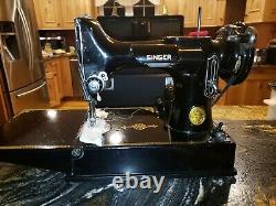 Antique portable singer sewing machine