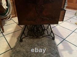 Antique singer sewing machine and cabinet works / needs new belt