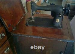 Antique singer sewing machine with table