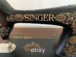 Antique1910 Singer sewing machine withaccessories And 6-drawer Treadle Cabinet