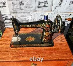 Astounding Antique Singer model 66 Red Eye sewing machine, back clamp atchm, 1915