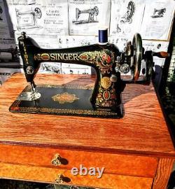 Astounding Antique Singer model 66 Red Eye sewing machine, back clamp atchm, 1915