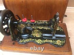 Beautiful Singer 12K New Family Fiddle base with Case and Ottoman Carnation