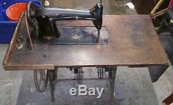 RARE SINGER 31-15 sewing machine with unusual iron ratcheting base, like treadle