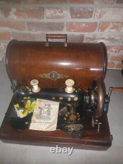 Rare 1888 Singer Improved Family Central bobbin sewing machine with wooden lid