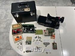 SINGER Featherweight 222k sewing machine complete with many accessories + case