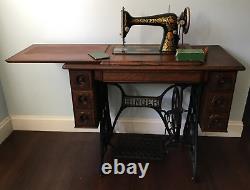 Singer 66 Red Eye Treadle Sewing Machine + Tiger Oak Cabinet Attachments Manual