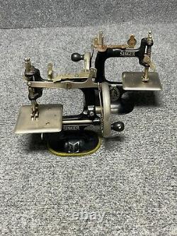 Singer Antique Mini Sewing Machine? Toy with Moving Wheel Shaft