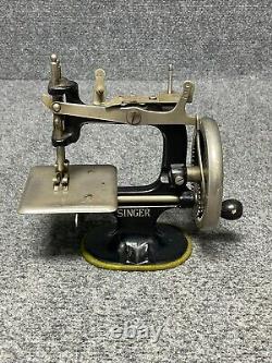 Singer Antique Mini Sewing Machine? Toy with Moving Wheel Shaft