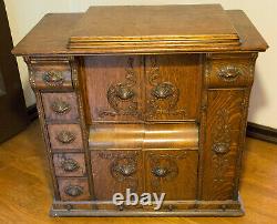 Singer Sewing Machine Model No. 66 Redeye Closed Wood Cabinet with Treadle