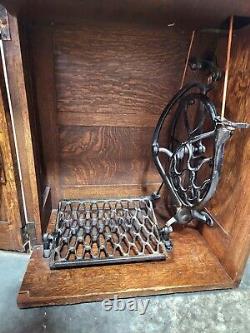 Singer Sphinx 127 Treadle Sewing Machine with Beautiful Antique Oak Closed Cabinet