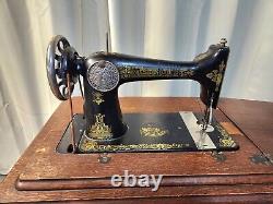 Singer Sphinx 127 Treadle Sewing Machine with Beautiful Antique Oak Closed Cabinet