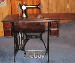 Singer Treadle Sewing machine withcabinet early 1900