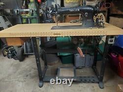 Singer industrial sewing machine 31-15 with motor, work table Motor runs