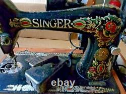 Singer sewing machine -1917 Red Eye Treadle Sewing Machine Model 66