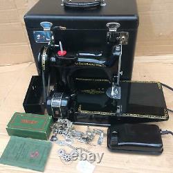 Vintage Singer 221K Featherweight Sewing Machine with attachments and manual