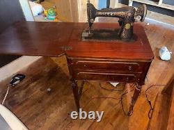 Vintage Singer 66 Sewing Machine with original table and lamp