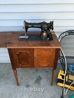 Vintage Singer Electric Sewing Machine Model 15-91 with cabinet circa 1932