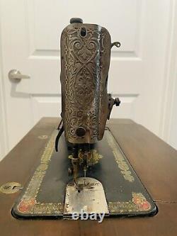 Vintage Singer Sewing Machine Red Eye Model 66