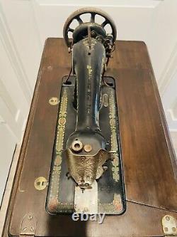 Vintage Singer Sewing Machine Red Eye Model 66