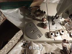 Vintage Singer Sewing Machine withcase, attachments & accessories. 110-120 volt