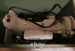 Vintage Singer Sewing Machine withcase, attachments & accessories. 110-120 volt