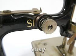 Machine à coudre Singer vers 1920