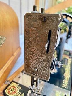 Machine à coudre manuelle Singer antique à manivelle